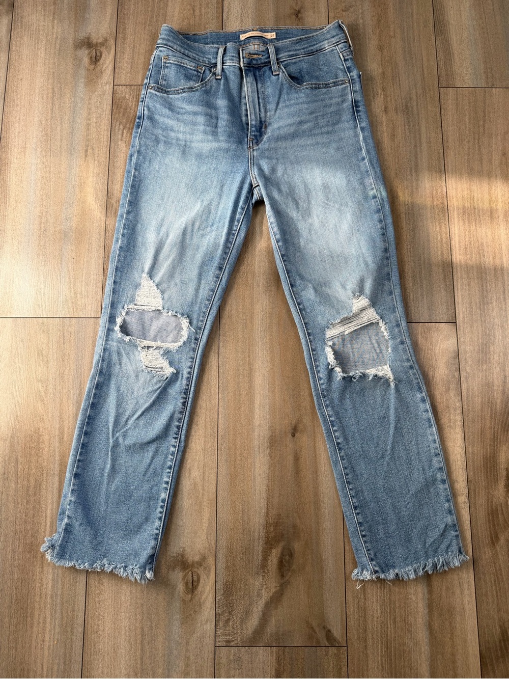 Levi's Light Wash Distressed Straight Leg Jeans